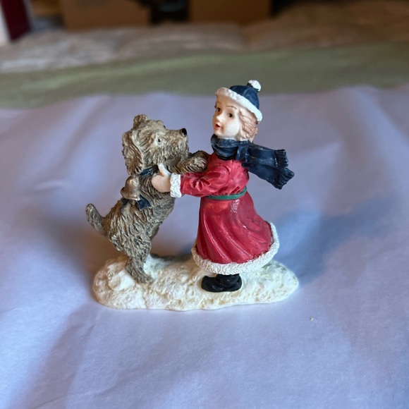 Sweet girl and her dog. Part of a holiday village. - Picture 1 of 8